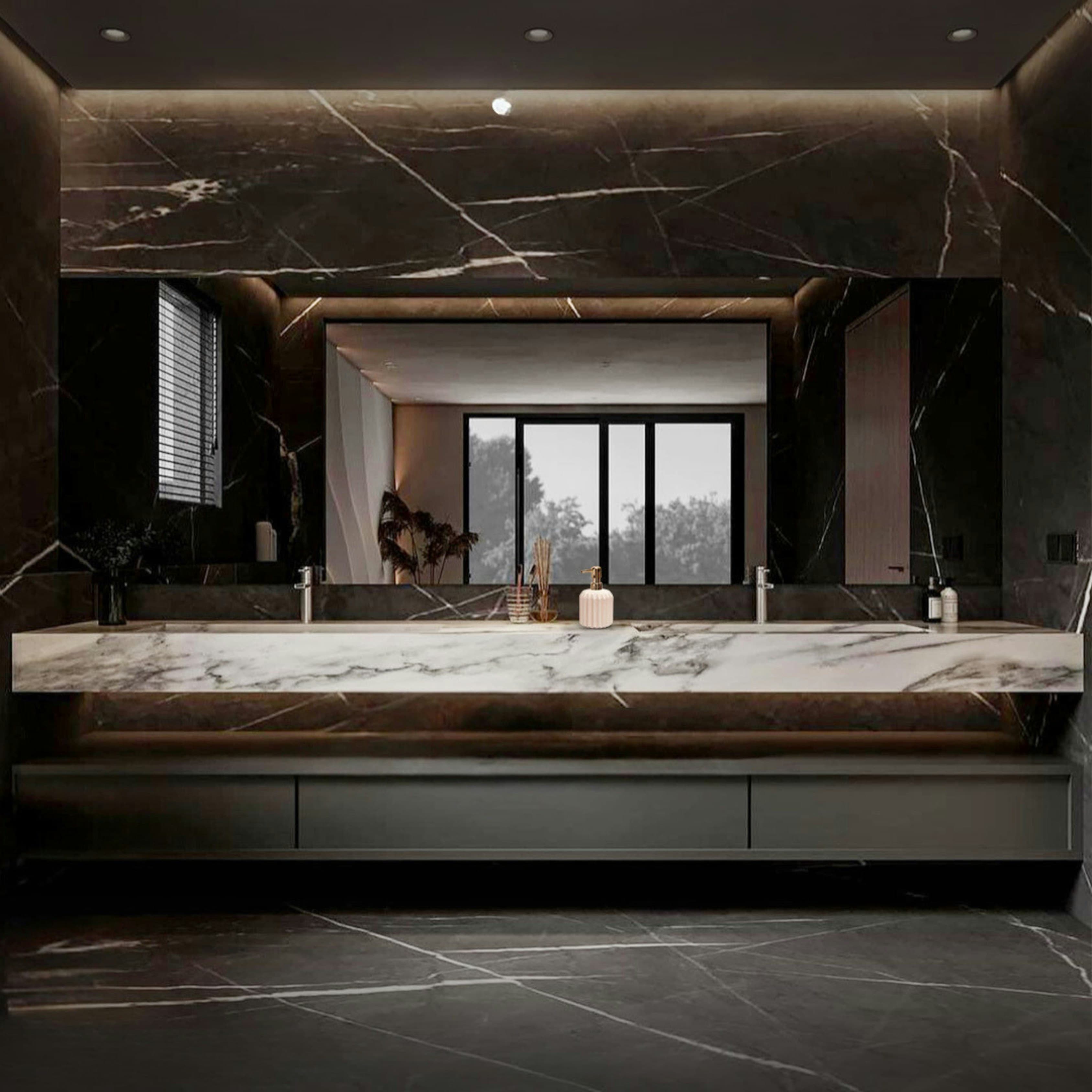 Modern luxury bathroom with marble countertops and ambient lighting